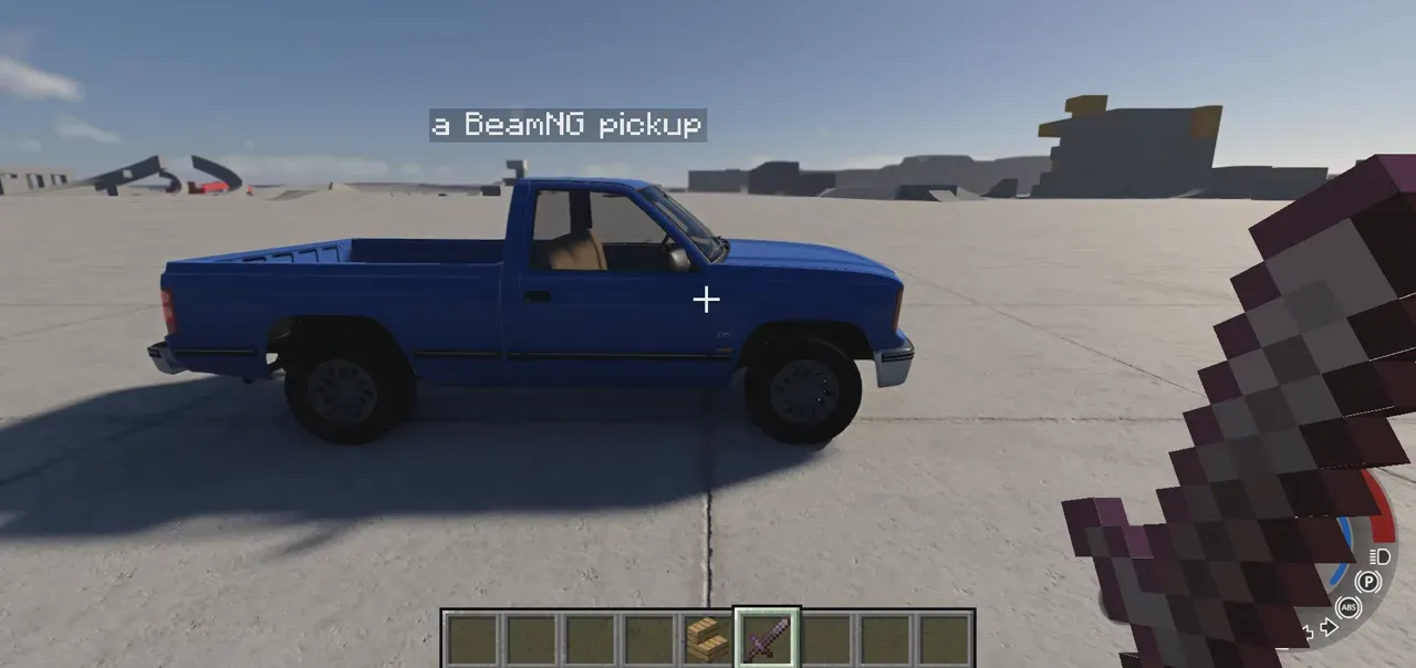 Minecraft's first-person view inside BeamNG.drive: a blue BeamNG pickup labelled "a BeamNG pickup" sits on a concrete lot, with Steve's sword in the corner and the Minecraft hotbar along the bottom.